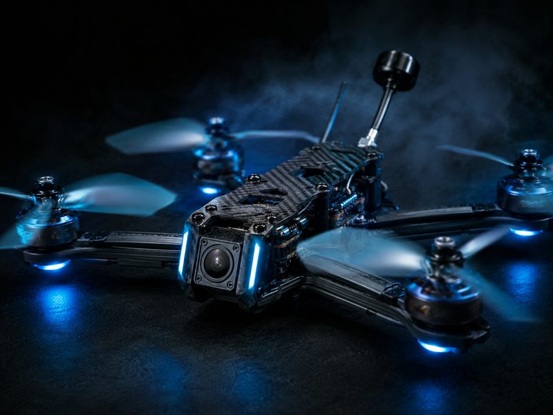 FPV racing drone with blue LED lights